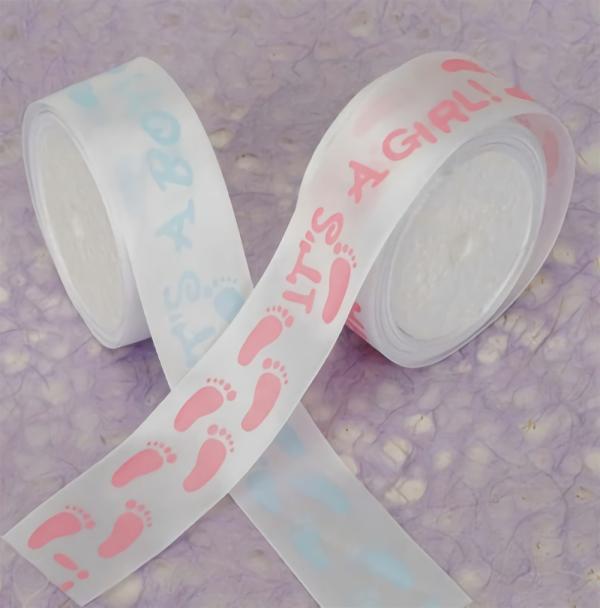 Not Wired |   White Satin Ribbon Printed W/ Light Blue Baby Feet "It’s A Boy", 1 ½ Inch X 10 Yards (1 Spool) Not Wired Not Wired